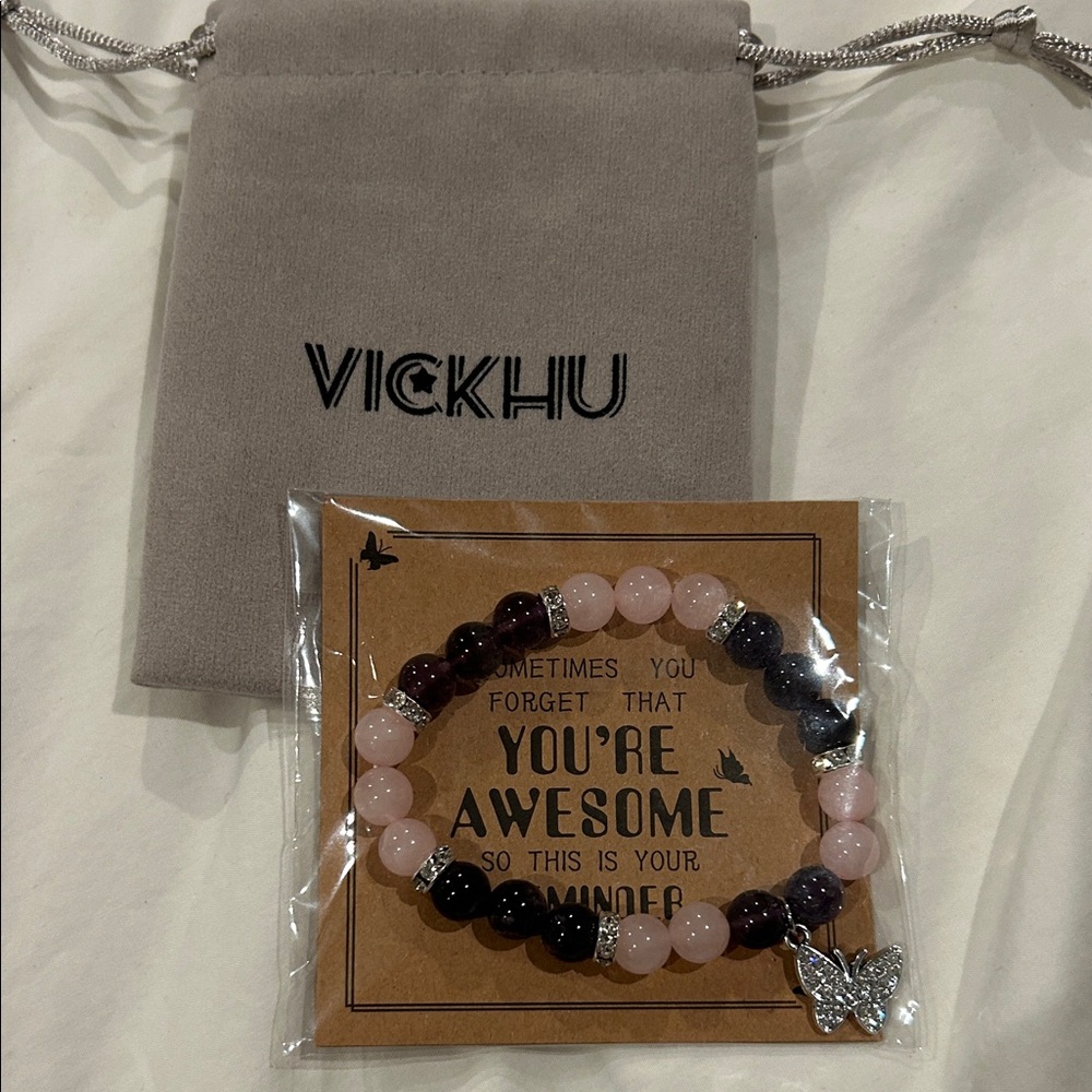 Pink and Black Beaded Bracelet with Butterfly Charm